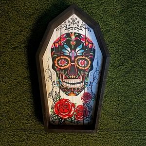 Day of the dead candle holder with wall mount.